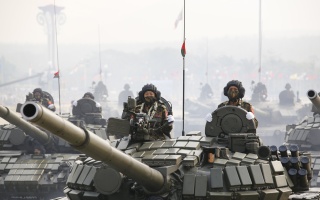 Military personnel participate in a parade on Armed Forces Day in Naypyitaw, Myanmar, March 27, 2021. Chirag Nagpal/Shutterstock